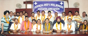 Elected members of Sheep and Wool Workers Association, Jammu division posing for group photograph on Monday.