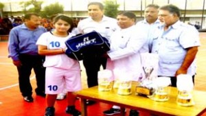 MLA Jammu West Sat Sharma distributing kits among National Basketball players.