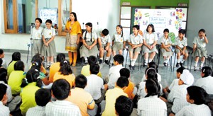 Students being watched during Intra-Class Talk Show at KCIS in Jammu on Thursday.