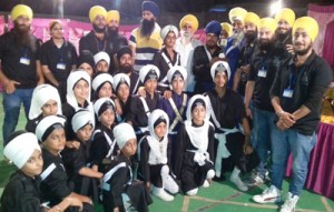 Winning team of 4th Virsa Sambhal Gatka Competition posing for group photograph.