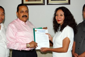 Union Minister Dr Jitendra Singh being presented a proposal for celebration of the birth centenary of famous Manipur born freedom fighter Rani Gaidinliu from Linda Newmai, Co-Convener of "BJP for Northeast", a unit of the Party, at New Delhi on Saturday.