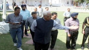 Governor N N Vohra inspecting Raj Bhavan premises on Tuesday.