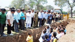 MLA Jammu West pacifying students who were protesting against raising a building on GGM Science College playground.