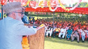 Former Minister Ali Mohd Sagar addressing party delegates during NC Convocation at Baramulla on Thursday. -Excelsior/ Abid Nabi