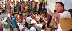Minister of State for PWD, Sunil Sharma addressing a public gathering at Galigarh on Monday.