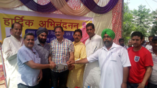 Speaker Kavinder Gupta during meeting with people at Jeevan Nagar in Gandhi Nagar constituency.