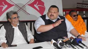 Provincial president of NC, Devender Singh Rana addressing press conference in Jammu on Tuesday. -Excelsior/Rakesh