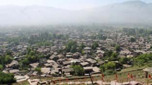 A view of cement dust covered Khrew town. -Excelsior/Younis Khaliq