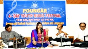 A young artist performing during Youth Music Festival at Jammu on Monday.