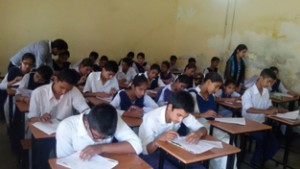 Students appearing in a scholarship test conducted by NILM at Jammu on Thursday.