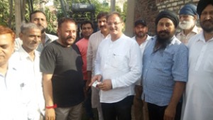 Speaker, Legislative Assembly, Kavinder Gupta during the inauguration of a power transformer at Nanak Nagar. 