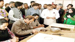 Minister for Industries, Chander Prakash inspecting Government Joinery Mill at Pampore on Wednesday.