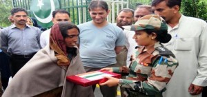 PoK woman during repatriation to Pakistan army in Nowshera sector on Wednesday.