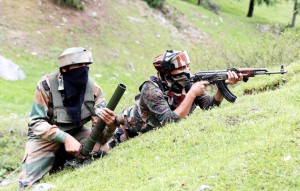 Army jawans in action during encounter at Tanghdar in Kupwara on Monday. -Excelsior/Aabid Nabi