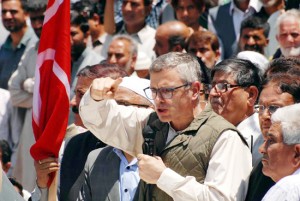 National Conference leader and former Chief Minister Omar Abdullah addressing a protest march  in Srinagar on Saturday. (UNI)