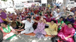 FMPHWs protesting for release of their pending salary on Friday. -Excelsior/Rakesh