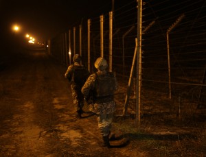 BSF jawans on high alert on the IB in Jammu on Tuesday. —Excelsior/Rakesh