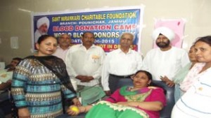 Donor donating blood on World Blood Donors Day on Saturday.