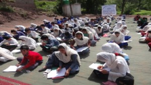 Students displaying their skills during painting compeition.