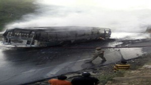 Passenger bus on fire near Domail on Saturday. 