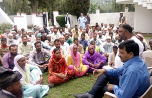 MLC Vibodh Gupta listening people’s problems at a public darbar at Rajouri on Thursday.