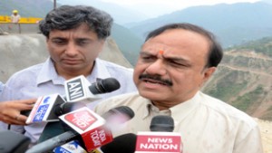 MoS Railway Manoj Sinha talking to media persons at Kouri in Reasi on Wednesday.— Excelsior/Vasu Gupta