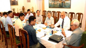 Governor N N Vohra chairing meeting of SMVD Shrine Board at Raj Bhavan on Tuesday.