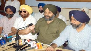 Delhi Sikh Gurdwara Management Committee president Manjit Singh addressing press conference in Jammu.  —Excelsior/Rakesh