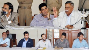 Minister for Public Health Engineering Sukhnandan Kumar Choudhary chairing a meeting at Pahalgam on Sunday.