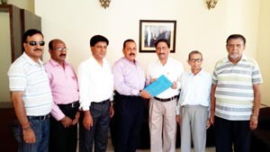 Union Minister Dr Jitendra Singh receiving a memorandum from a civil society delegation led by prominent activist Ashwani Charungoo  at Jammu on Monday. -Excelsior/ Rakesh