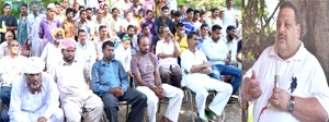 Provincial President NC, Devender Singh Rana addressing a public meeting in Nagrota Assembly segment on Monday.