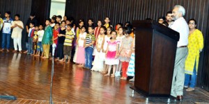 JU VC Prof R D Sharma addressing children during valedictory function of theatre workshop on Thursday.