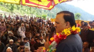 MLA G M Saroori addressing a public meeting at Chingam in Chatroo on Sunday.