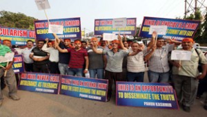 Panun Kashmir activists taking out a protest march at Jammu on Saturday. -Excelsior/Rakesh