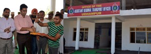 DDC, Dr Shahid Iqbal Choudhary flanked by RTO, Ashwani Khajuria inaugurating Model ARTO office at Udhampur on Monday.
