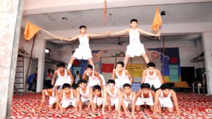 Children displaying their talent during Charitar Nirman Shivir on Monday.