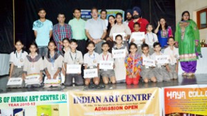 Participants of Basohli painting exhibition posing for photograph with Speaker Kavinder Gupta.
