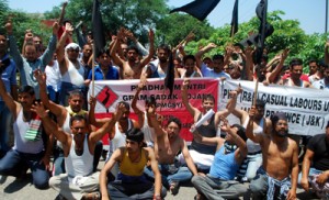 PWD casual labours raising slogans during protest at Jammu on Monday.       	      -Excelsior/Rakesh