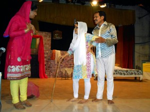 A scene from Dogri play ‘Jailey de Qaidi’ staged in Drama Festival at NHPC Auditorium, Jyotipuram in Reasi.
