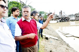 Minister for Flood Control Sukhnandan Kumar during visit to Srinagar city on Thursday.