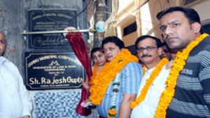 MLA Jammu East, Rajesh Gupta inaugurating a lane in Ward 10 on Tuesday.