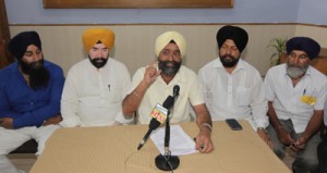 Sikh United Front leaders addressing press conference on Saturday.                    —Excelsior/Rakesh