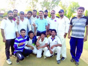 Players of Eleven Star Cricket Club posing for group photograph after winning match at Akhnoor on Friday.