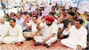 FORCE members and students protesting at Udhampur on Wednesday.