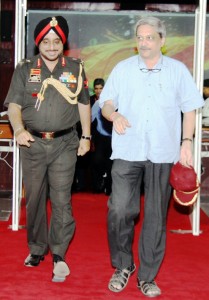 Defence Minister Manohar Parrikar with Western Army Command chief Lt Gen K J Singh on Saturday.