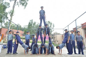 Scouts performing adventurous activity during inaugural ceremony of Residential Tritya Sopan Testing Camp in Jammu.