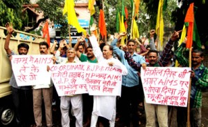 Workers of Dogra Front and Shiv Sena protesting against delay in announcement of AIIMS at Jammu. 