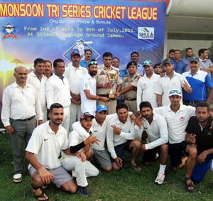 Triumphant Simula Club players receiving winning trophy from  chief guest Danish Rana at GGM Science College Hostel Ground in Jammu. 