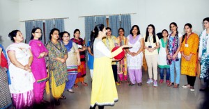 Resource person delivering lecture during a workshop at KCIS in Jammu