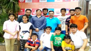 J&K Chess players posing for group photograph with Atul Kumar Gupta and Team Manager Vikas Nanda.